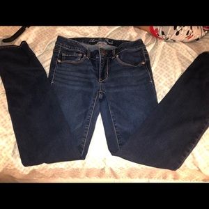 Size 6 dark wash straight legged jeans.
